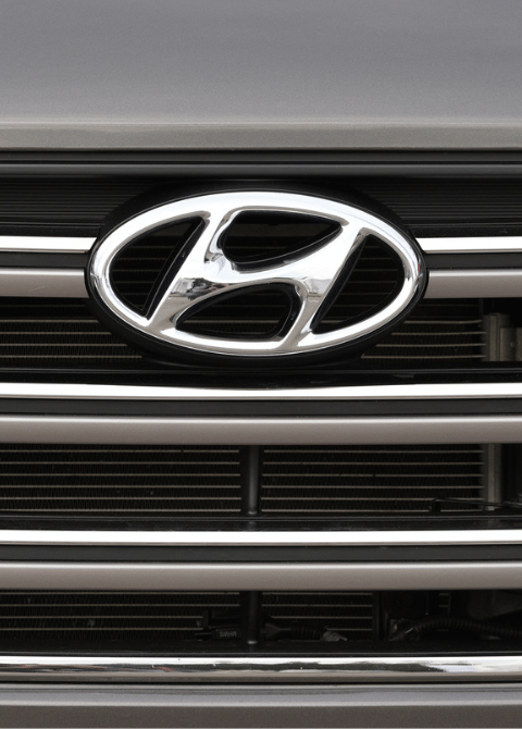 Hyundai and Kia Owners: Theft Prevention Tips. A Hundai car's emblem and grill.